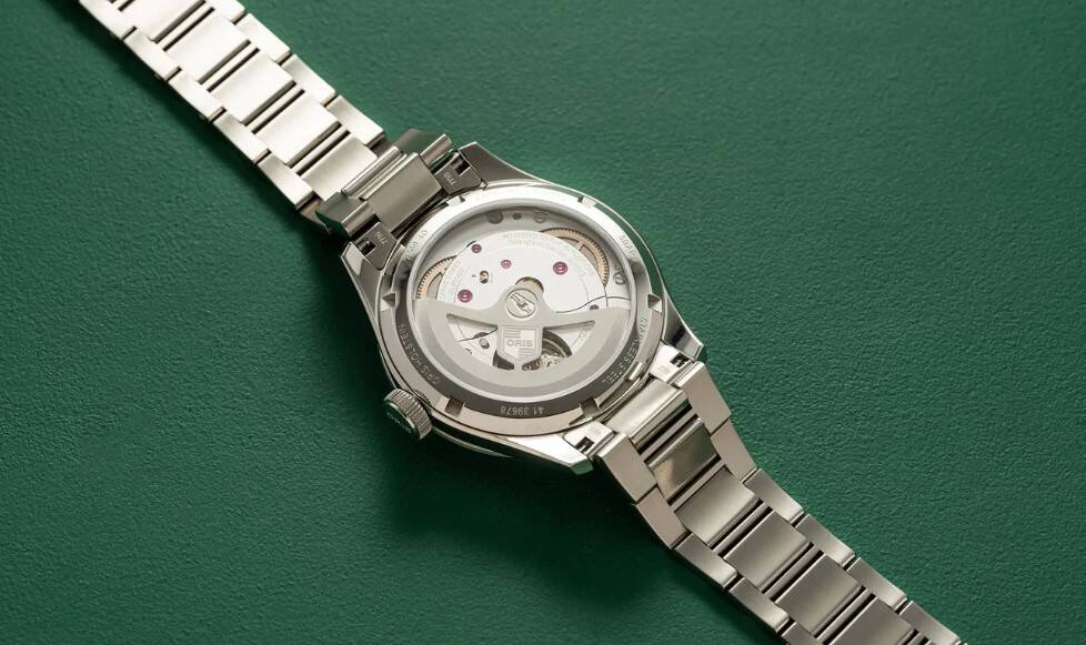 several varieties of gold chains glimmer in the light. 